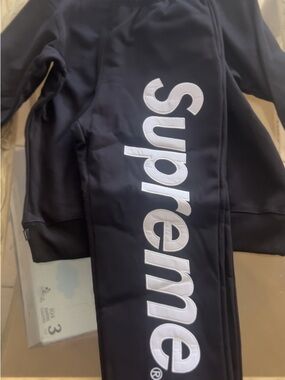 Supreme Black Tracksuit with White Vertical Logo